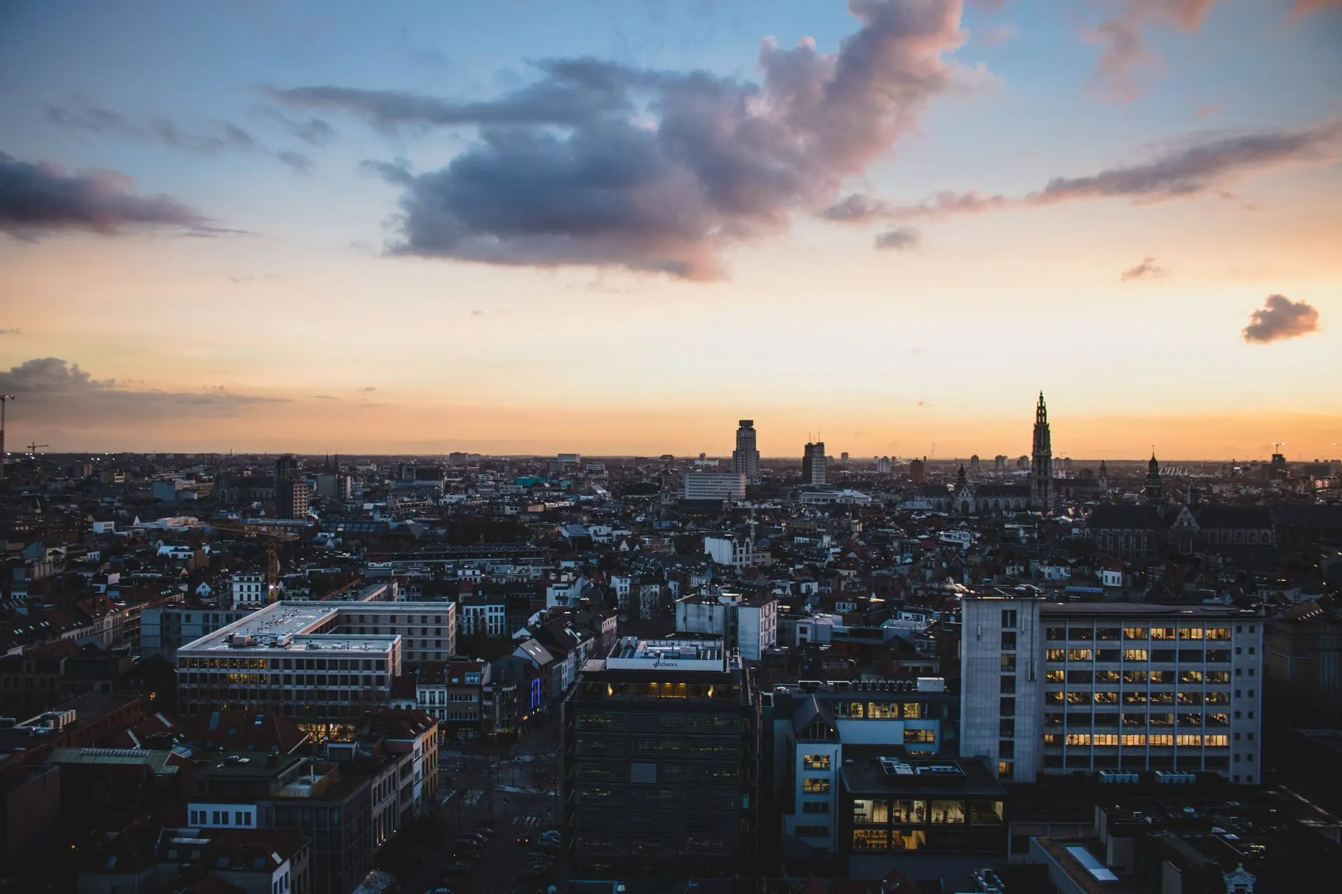 City skyline at dusk — NABarFinder covers non-alcoholic-friendly bars across the US, UK, and beyond